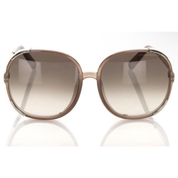Chloé CE712S sunglasses feature a distinct brown and gold oversized round frame main image 7